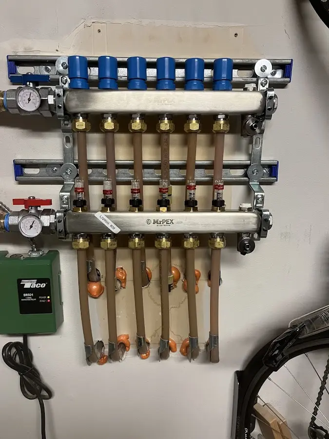 Plumber performing Water Heater Repair at a residential property in Wyoming